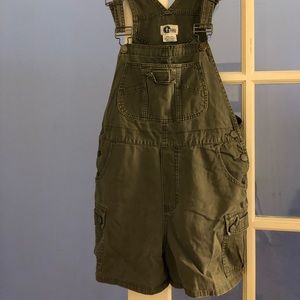 Olive green overalls.
